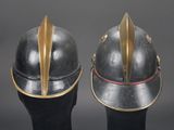 two helmets that are sitting on top of each other