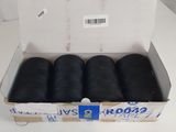 six spools of black thread in a box on a white surface