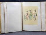 an open book with a drawing of a group of people on it
