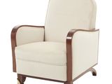 une chaise blanche aux pieds en bois et à l'assise rembourrée beige