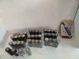 many batteries that are sitting on a shelf