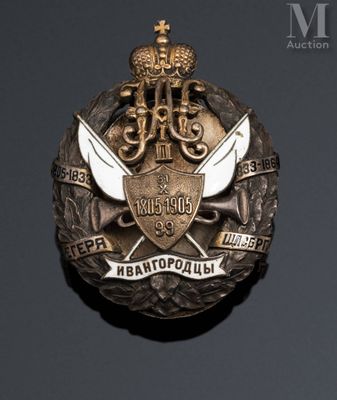 an image of a badge with a crown on top of it