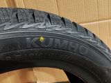 a close up of a tire on a cardboard box