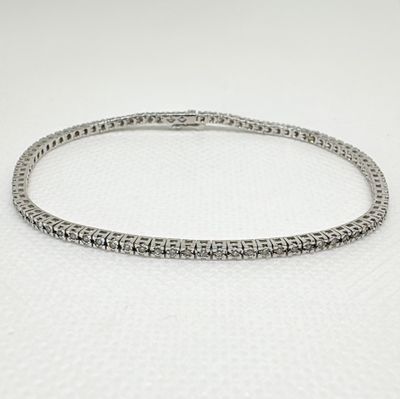 Bracelet rivière (tennis) en or blanc 18K 750/1000, entièrem…