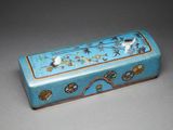 an image of a blue box with birds and flowers painted on it