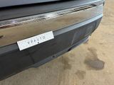 a close up of a car with a sticker on it