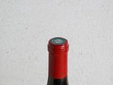 a bottle of wine that is sitting on a table