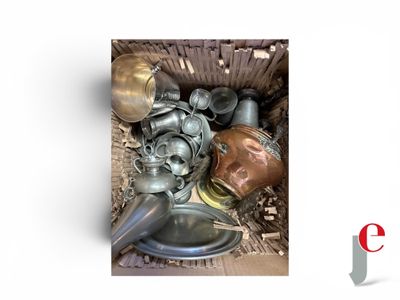 a box full of old metal items that are in it