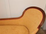 a couch that is sitting in the corner of a room