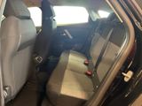 the back seats of a car are empty in the car