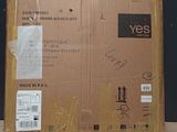 a box that is sitting on the floor in front of a wall