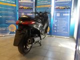 a motorcycle that is parked in a showroom