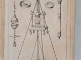 an old book with a drawing of a tower on it