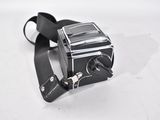 a small camera with a strap attached to it