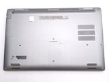 a laptop that is sitting on a white surface
