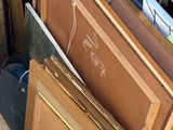several pieces of wood are stacked on top of each other in a pile