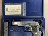 a blue case with a gun inside of it sitting on a table