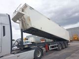 a white semi truck with a white trailer attached to it