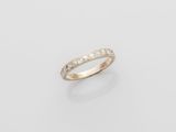 a white gold ring with diamonds on a white background