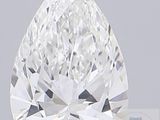 un diamant en forme de poire sur fond gris