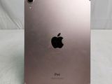 a close up of an ipad on a table with a white background