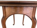 a wooden table with a drawer on top of it