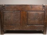 an old wooden chest with two doors on it