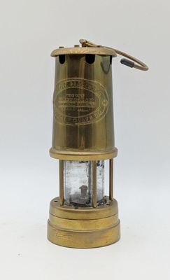 an old brass lantern on a white background with a white background
