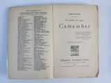 an open book on a table with a list of items on it