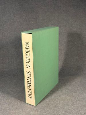 an image of a green book sitting on top of a table