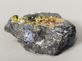 a piece of rock that has some kind of substance on it