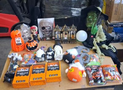 a table with a lot of halloween items on it