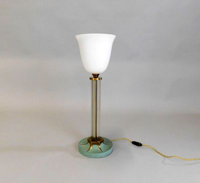 an image of a table lamp with a white glass shade on it