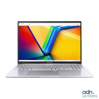 the laptop is open and ready to be used on the white background