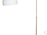 a white lamp with a black base and a white shade