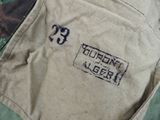 a close up of a military jacket with the number 35 on it