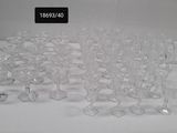 a lot of empty wine glasses sitting on a table