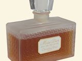 an image of a bottle of perfume on a white background