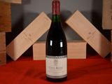 a bottle of wine that is sitting on a table