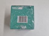 a small green box with a barcode on it