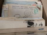 a lot of mails in a box on the table