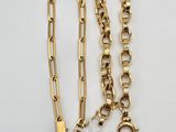 two gold chain bracelets and a gold chain bracelet