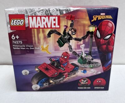 spider - man and green goblin battle in the box of the lego spider - man set