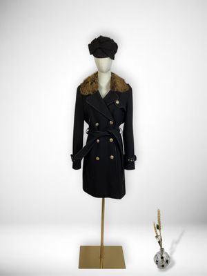 black coat with fur collar and buttons on mannequin base