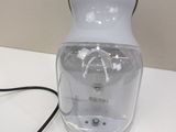 a water bottle with a cord attached to it