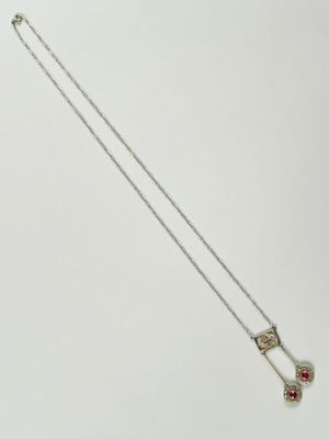 sterling silver necklace with a red stone and a pearl pendant