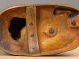 a close up of a bronze sculpture of a dog
