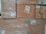 a lot of boxes stacked on top of each other in a warehouse