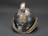 an old helmet with a star on the front and a star on the back