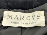 marc v ' s label on a black jacket